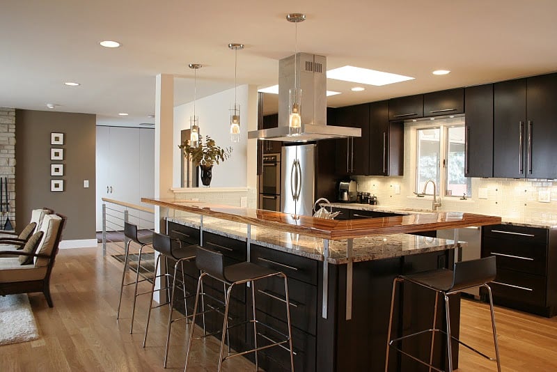 Contemporary kitchen remodel with espresso slab cabinets