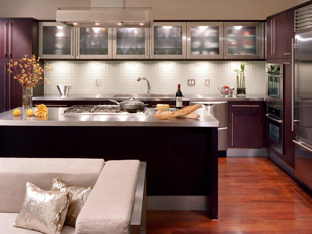 Contemporary kitchen with metal and glass cabinet doors