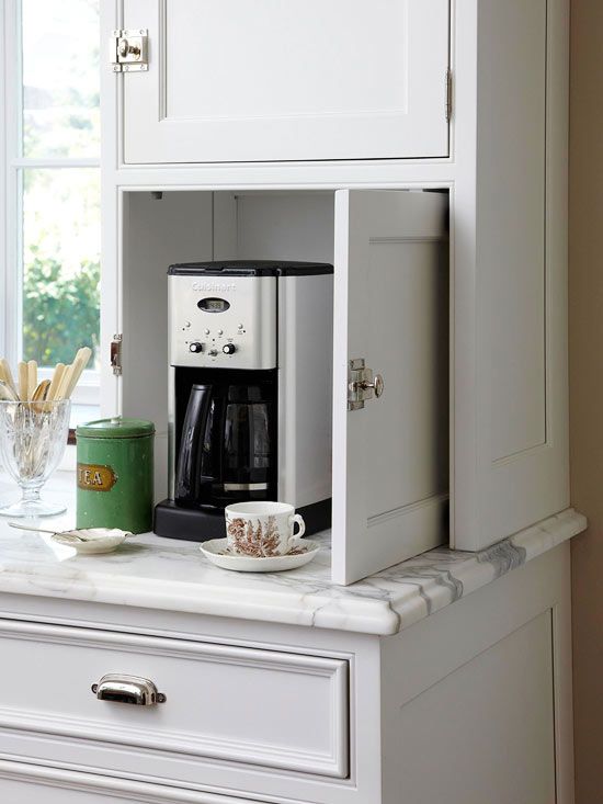 Appliance cabinet garage with coffee maker