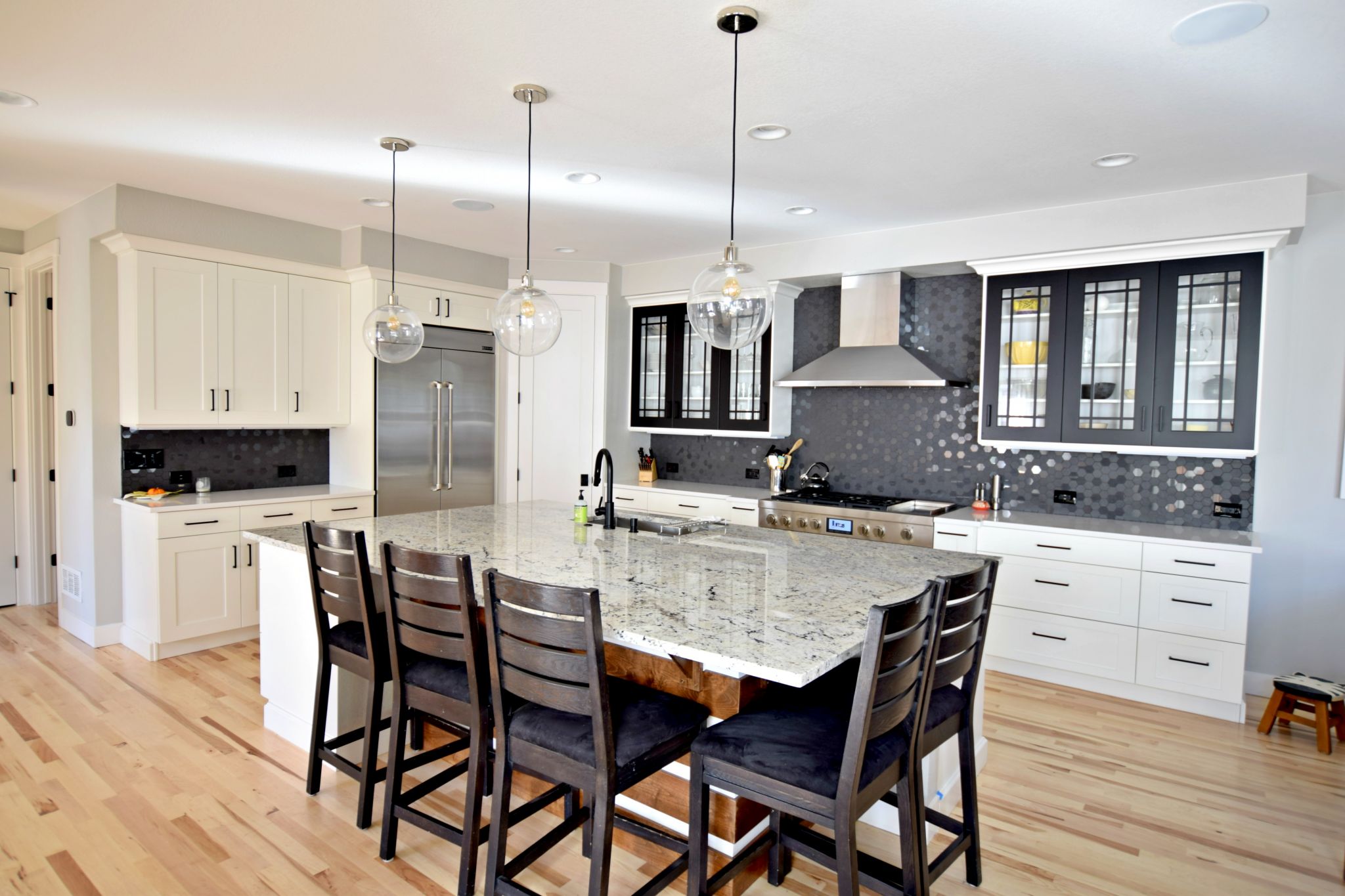 White and gray kitchen cabinets and large center island