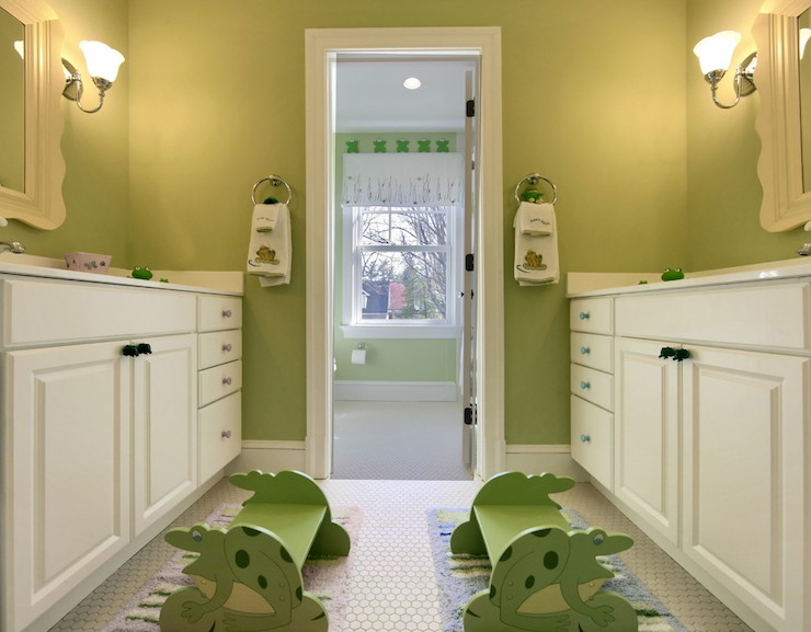 Kids bathroom with dual frog foot stools