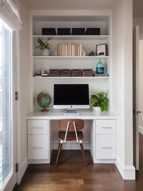 home office nook with modern white cabinets