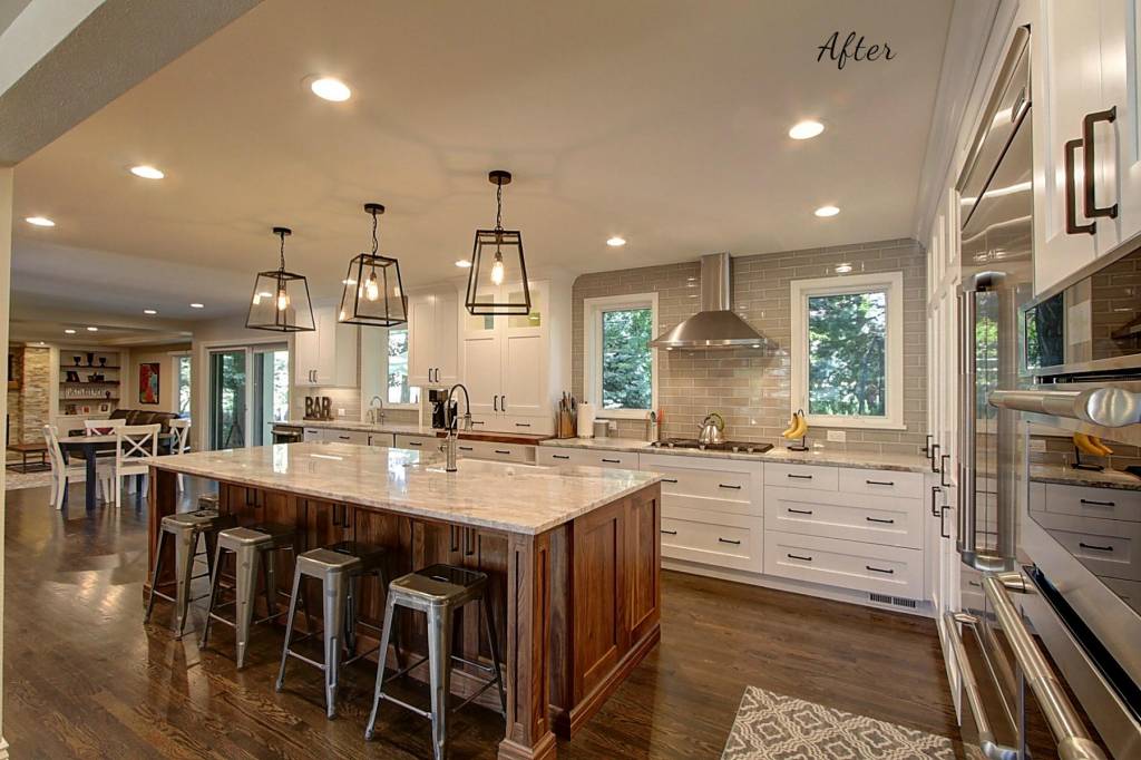 Denver kitchen remodel featuring white shaker cabinets and alder center island