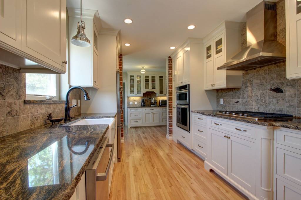 Urban kitchen with white shaker cabinets