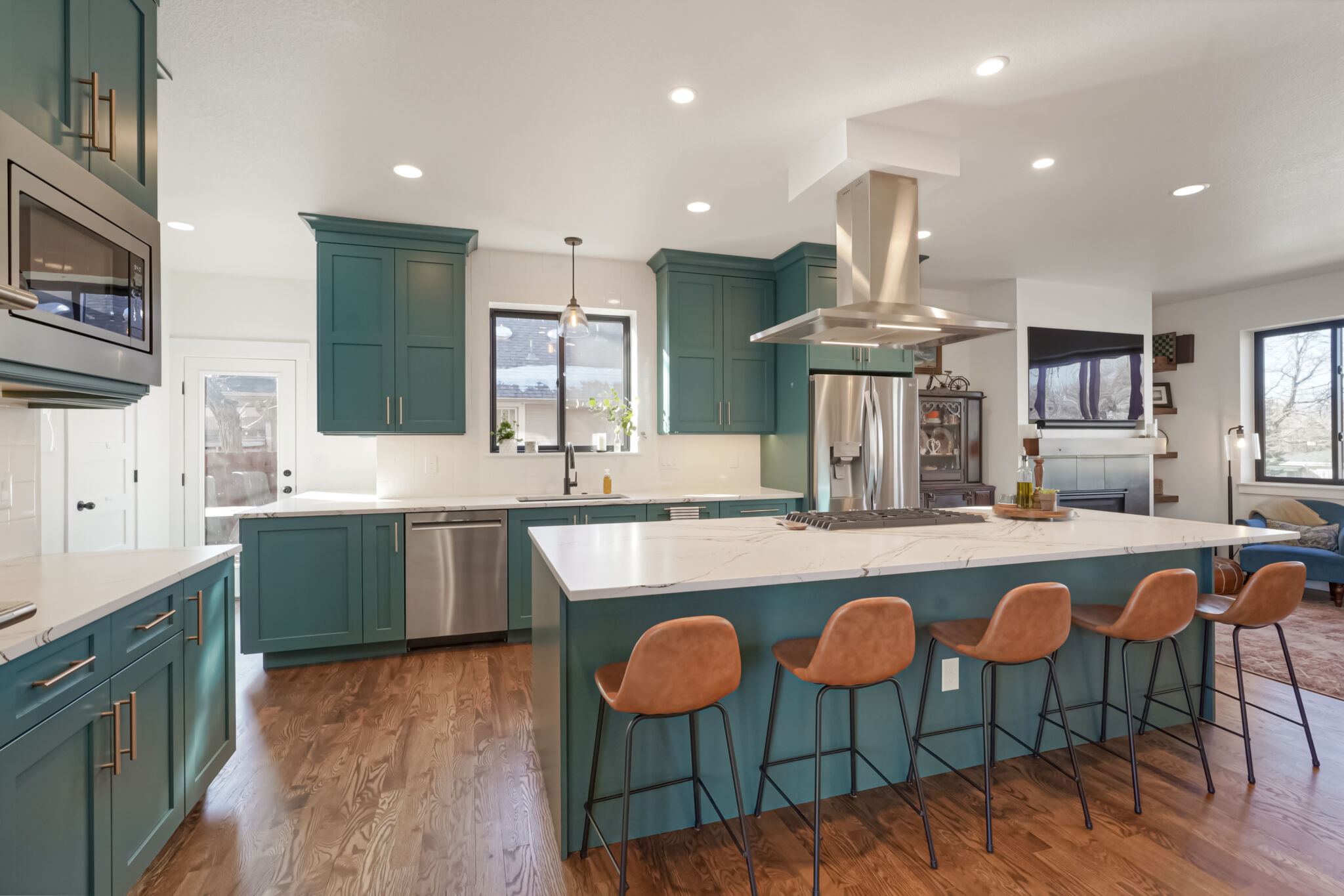 Kitchen remodel with teal green shaker cabinets