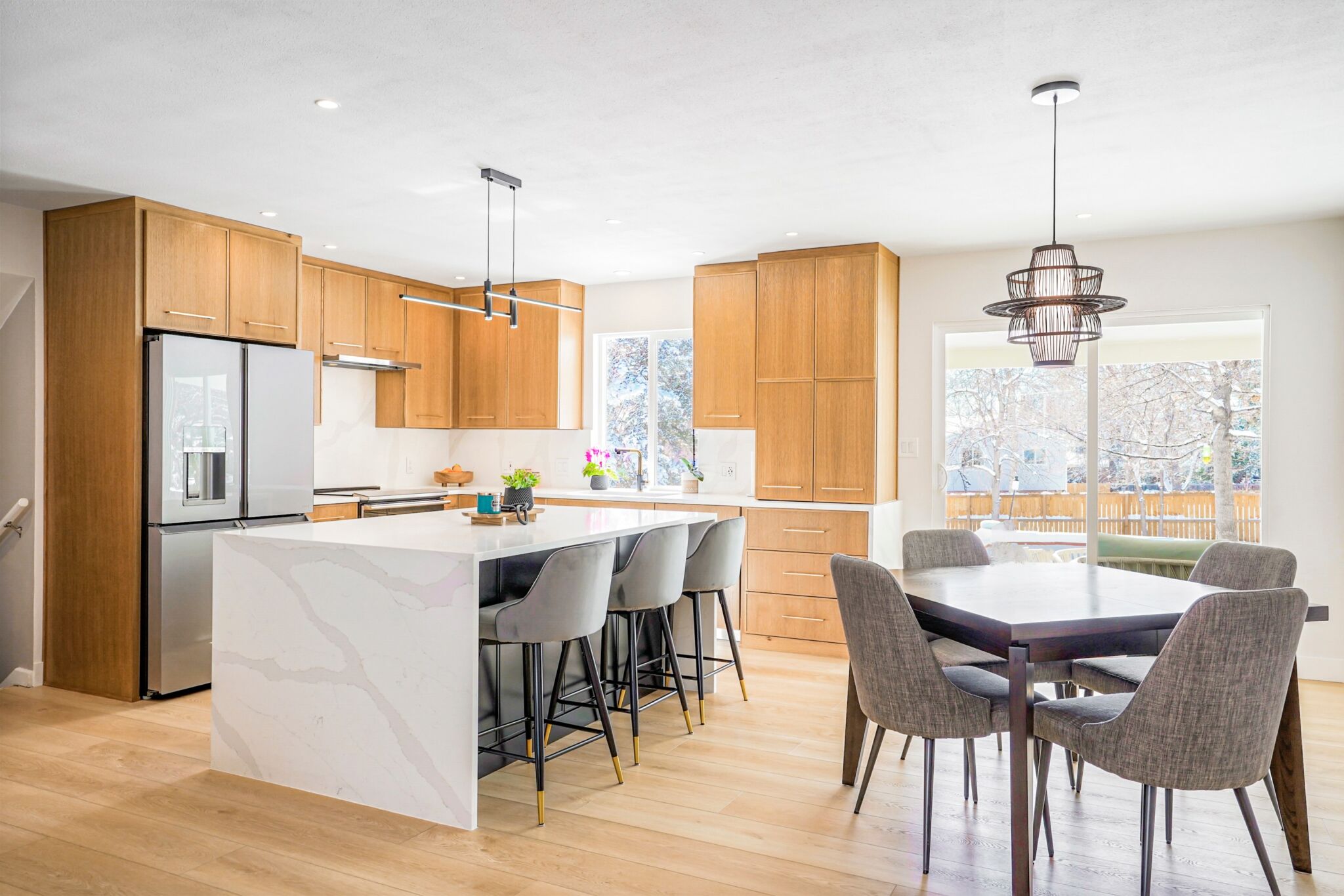 BKC Kitchen and Bath mid century modern style kitchen with flat panel light wood cabinetry