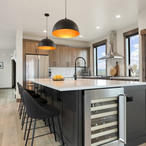 Mountain home with rustic beech cabinets and a large center island