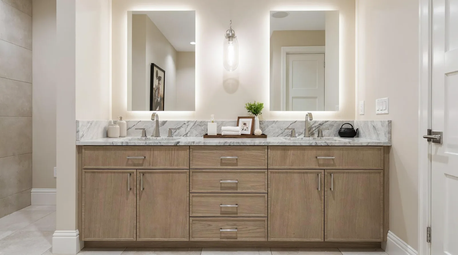 BKC Kitchen & Bath narrows vanity. Cabinet decisions by pairing Denver homeowners with cabinetry